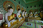 Myanmar - Sagaing hill, Umin Thounzeh (the 30 Caves), a colourful crescent-shaped colonnade within which there are 45 Buddha images. 